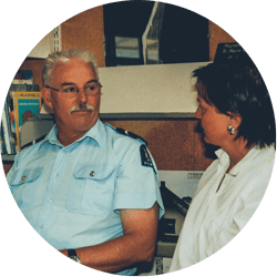 A police officer sitting with a Kidpower instructor